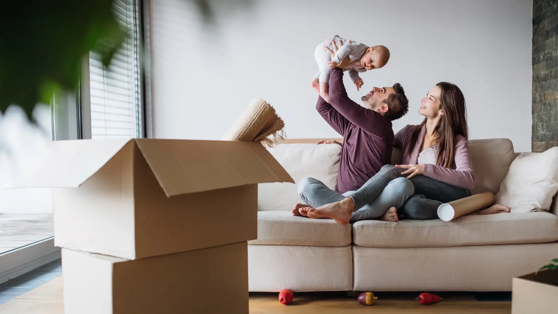 Homebuyers reviewing down payment assistance options with an advisor